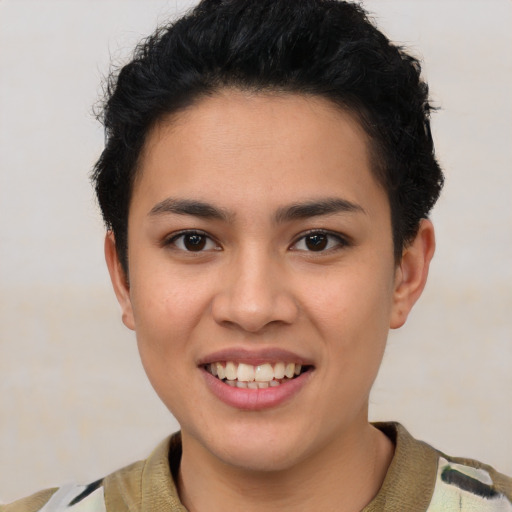 Joyful latino young-adult female with short  brown hair and brown eyes