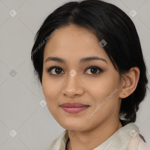 Joyful asian young-adult female with medium  black hair and brown eyes