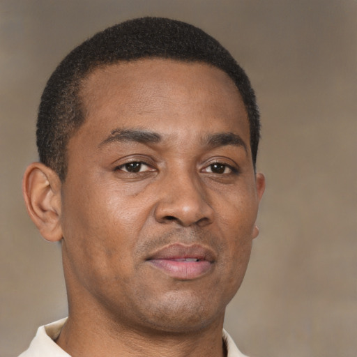 Neutral black adult male with short  brown hair and brown eyes