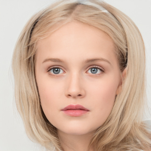 Neutral white child female with medium  brown hair and blue eyes