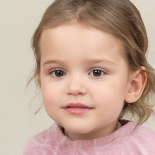 Joyful white child female with medium  brown hair and grey eyes