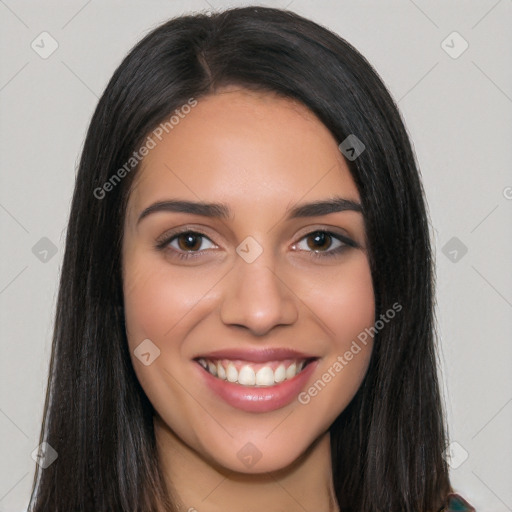 Joyful white young-adult female with long  black hair and brown eyes