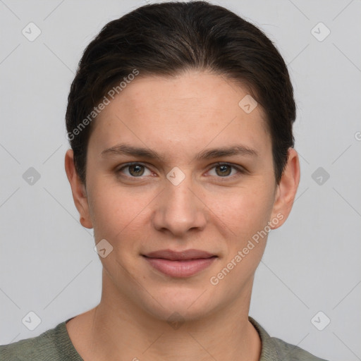 Joyful white young-adult female with short  brown hair and grey eyes