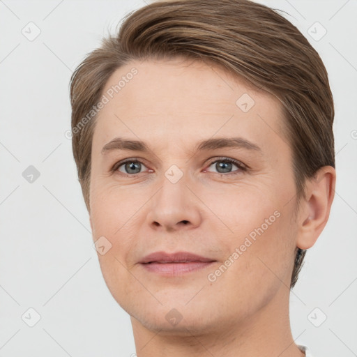 Joyful white young-adult female with short  brown hair and grey eyes