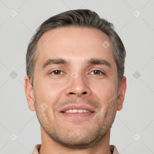 Joyful white adult male with short  brown hair and brown eyes