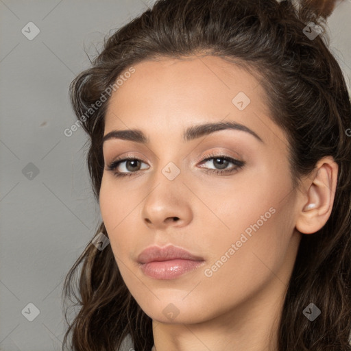 Neutral white young-adult female with long  brown hair and brown eyes