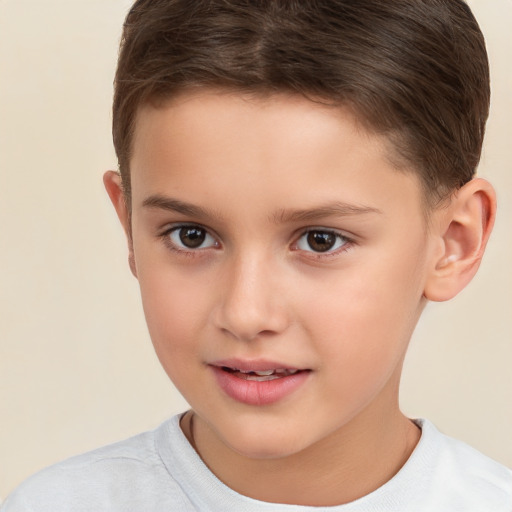 Joyful white child male with short  brown hair and brown eyes