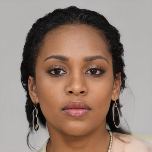 Neutral black young-adult female with long  black hair and brown eyes