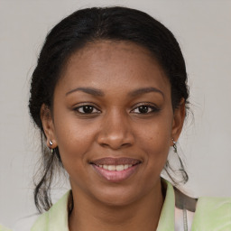 Joyful latino young-adult female with medium  brown hair and brown eyes