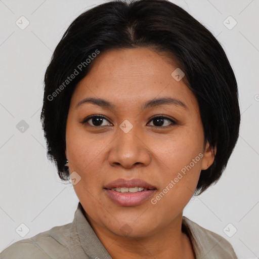 Joyful asian young-adult female with medium  black hair and brown eyes