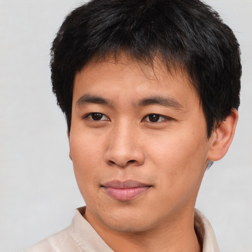 Neutral asian young-adult male with short  brown hair and brown eyes