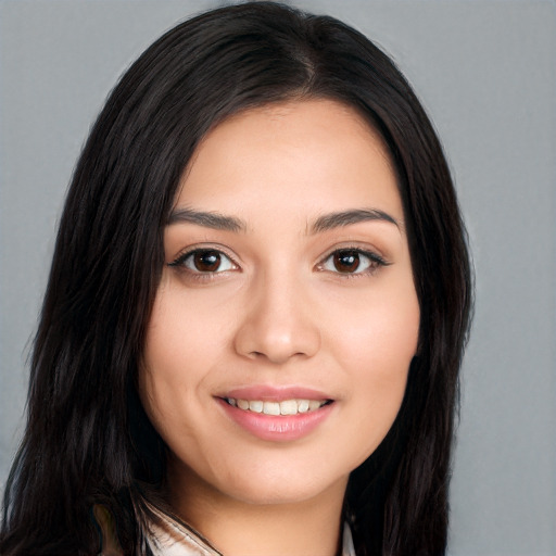 Joyful white young-adult female with long  black hair and brown eyes