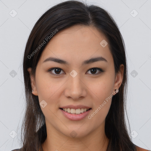 Joyful latino young-adult female with long  brown hair and brown eyes