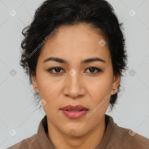 Joyful latino adult female with short  brown hair and brown eyes