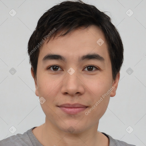 Joyful asian young-adult male with short  black hair and brown eyes