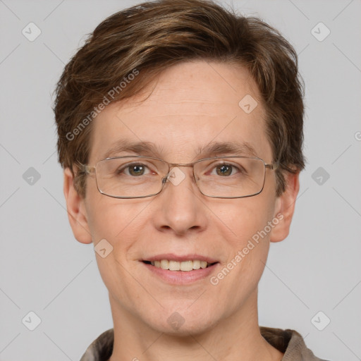 Joyful white adult male with short  brown hair and grey eyes