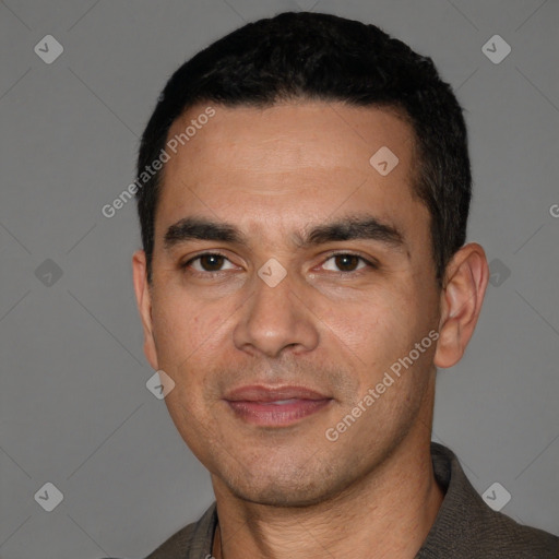 Joyful white young-adult male with short  black hair and brown eyes