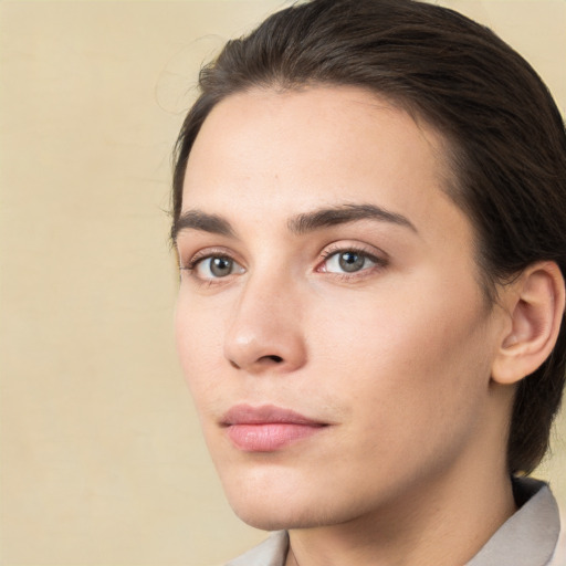 Neutral white young-adult female with medium  brown hair and brown eyes