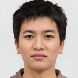 Neutral asian young-adult male with short  brown hair and brown eyes