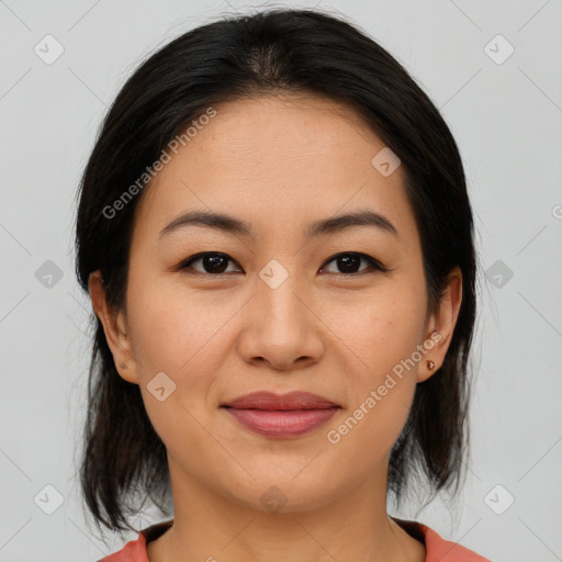 Joyful asian young-adult female with medium  brown hair and brown eyes