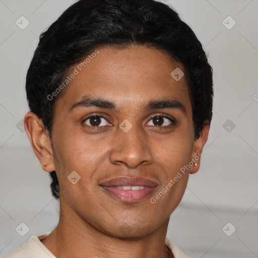 Joyful latino young-adult male with short  brown hair and brown eyes