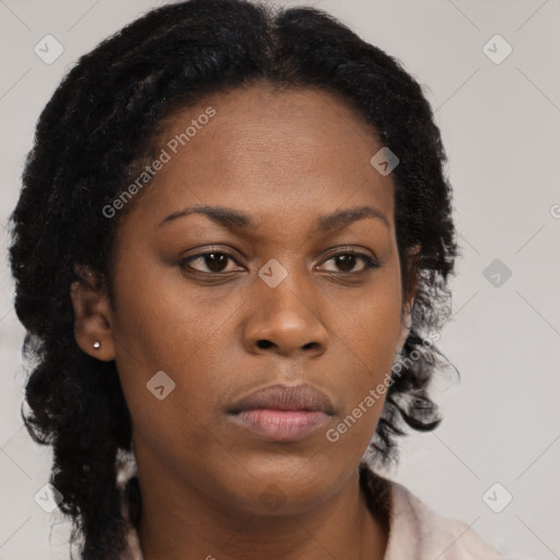 Neutral black young-adult female with long  brown hair and brown eyes