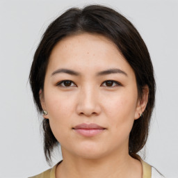 Neutral asian young-adult female with medium  brown hair and brown eyes