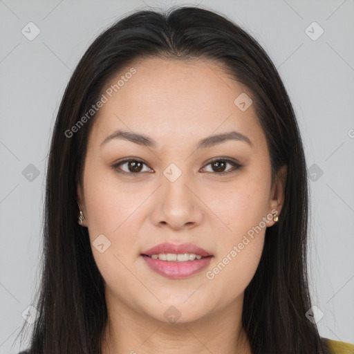 Joyful latino young-adult female with long  brown hair and brown eyes