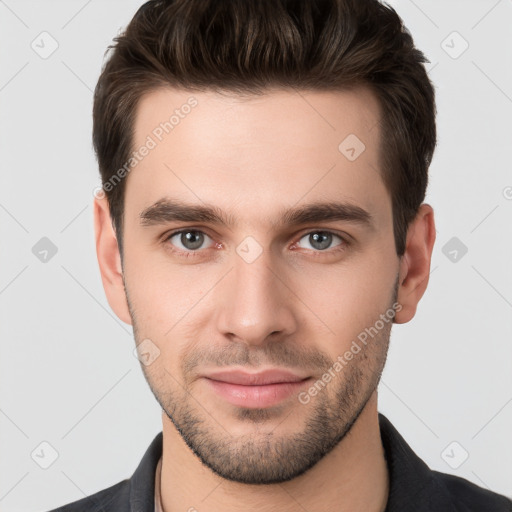 Neutral white young-adult male with short  brown hair and brown eyes