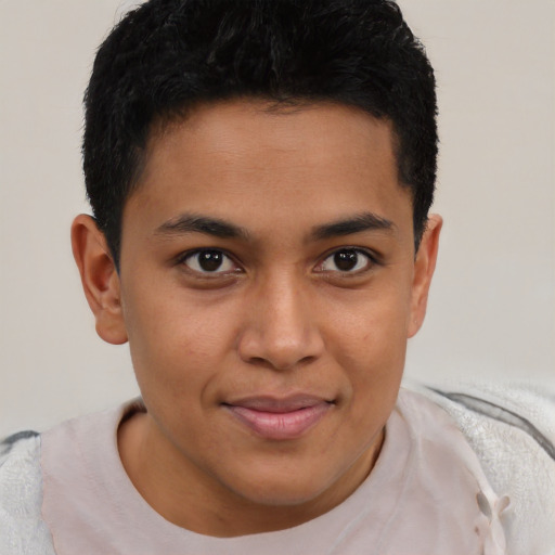 Joyful latino young-adult male with short  brown hair and brown eyes