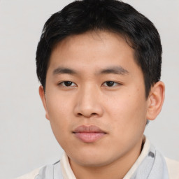 Neutral asian young-adult male with short  brown hair and brown eyes