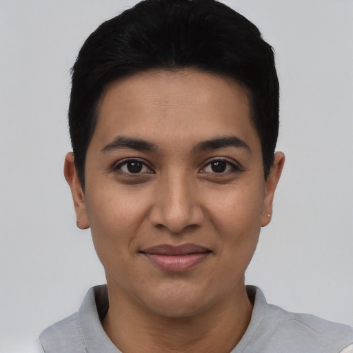 Joyful asian young-adult female with short  black hair and brown eyes