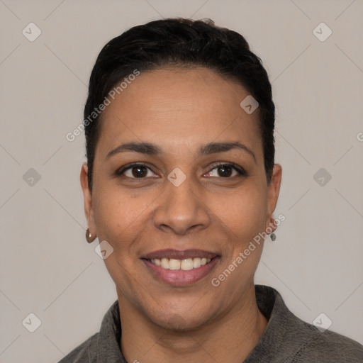 Joyful latino young-adult female with short  black hair and brown eyes