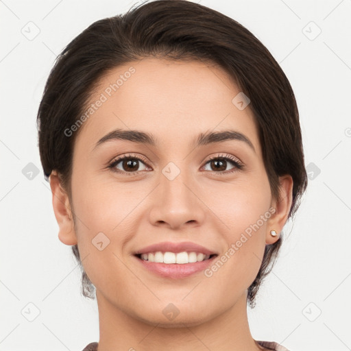 Joyful white young-adult female with medium  brown hair and brown eyes