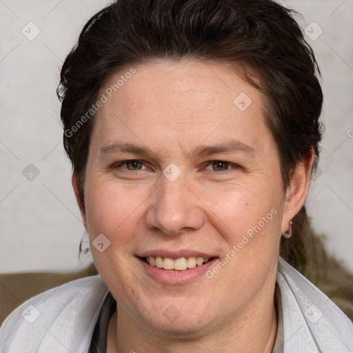 Joyful white adult female with short  brown hair and brown eyes