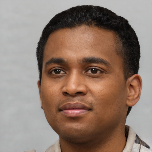 Neutral black young-adult male with short  black hair and brown eyes