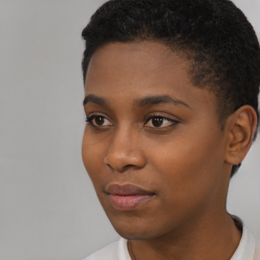 Neutral black young-adult female with short  black hair and brown eyes