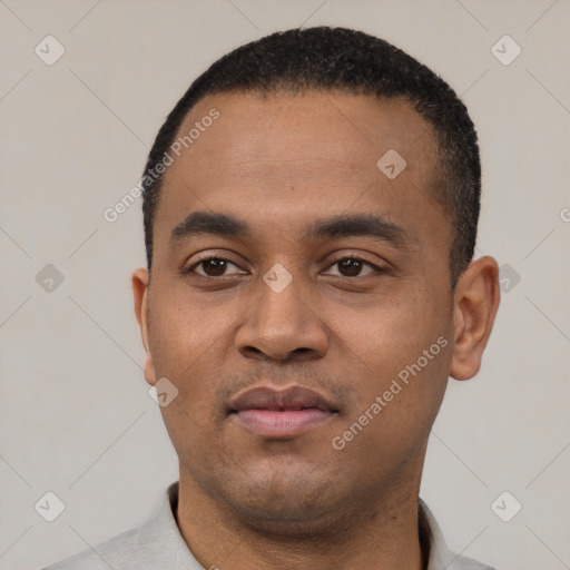 Neutral latino young-adult male with short  black hair and brown eyes