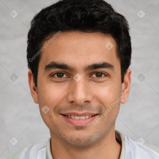 Joyful white young-adult male with short  black hair and brown eyes