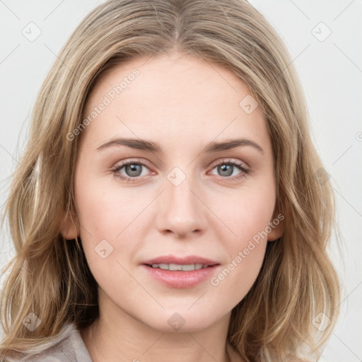 Joyful white young-adult female with medium  brown hair and green eyes