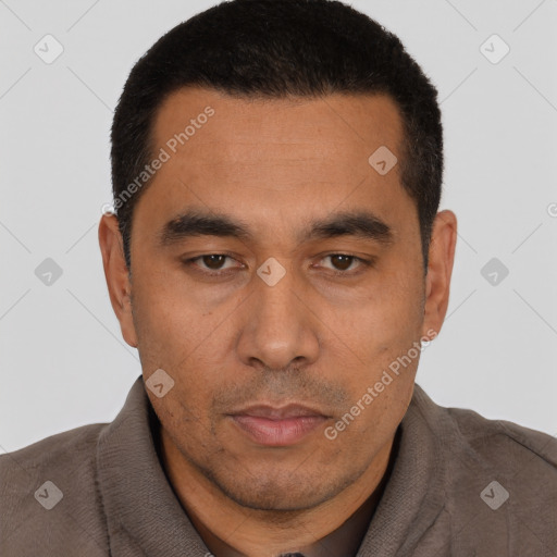 Neutral latino young-adult male with short  black hair and brown eyes