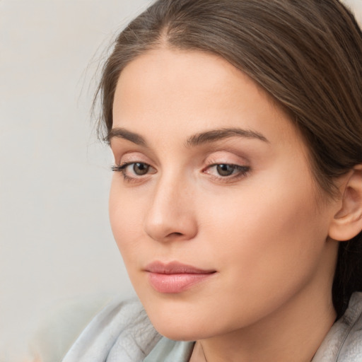 Neutral white young-adult female with medium  brown hair and brown eyes