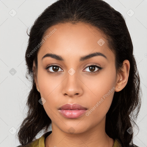 Neutral latino young-adult female with long  brown hair and brown eyes