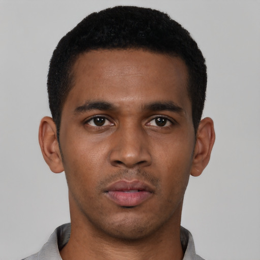 Neutral black young-adult male with short  black hair and brown eyes