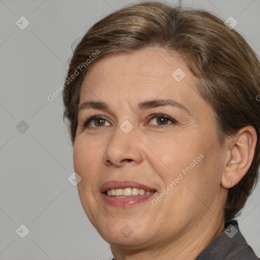 Joyful white adult female with medium  brown hair and brown eyes