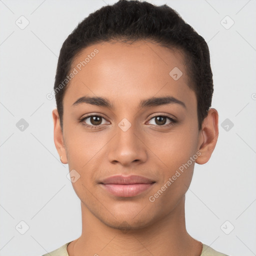 Joyful latino young-adult female with short  brown hair and brown eyes