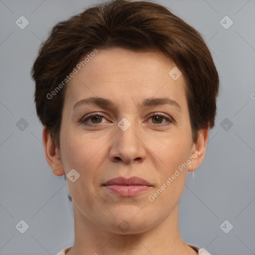 Joyful white adult female with short  brown hair and brown eyes