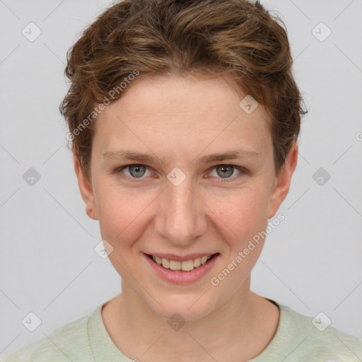 Joyful white young-adult female with short  brown hair and grey eyes