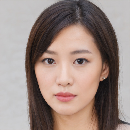 Neutral asian young-adult female with long  brown hair and brown eyes