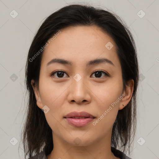 Joyful asian young-adult female with medium  brown hair and brown eyes